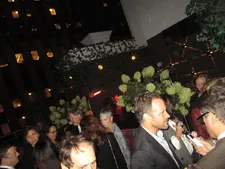 Peter Sarsgaard meets the press on the PH-D Terrace as Maggie Gyllenhaal comes over